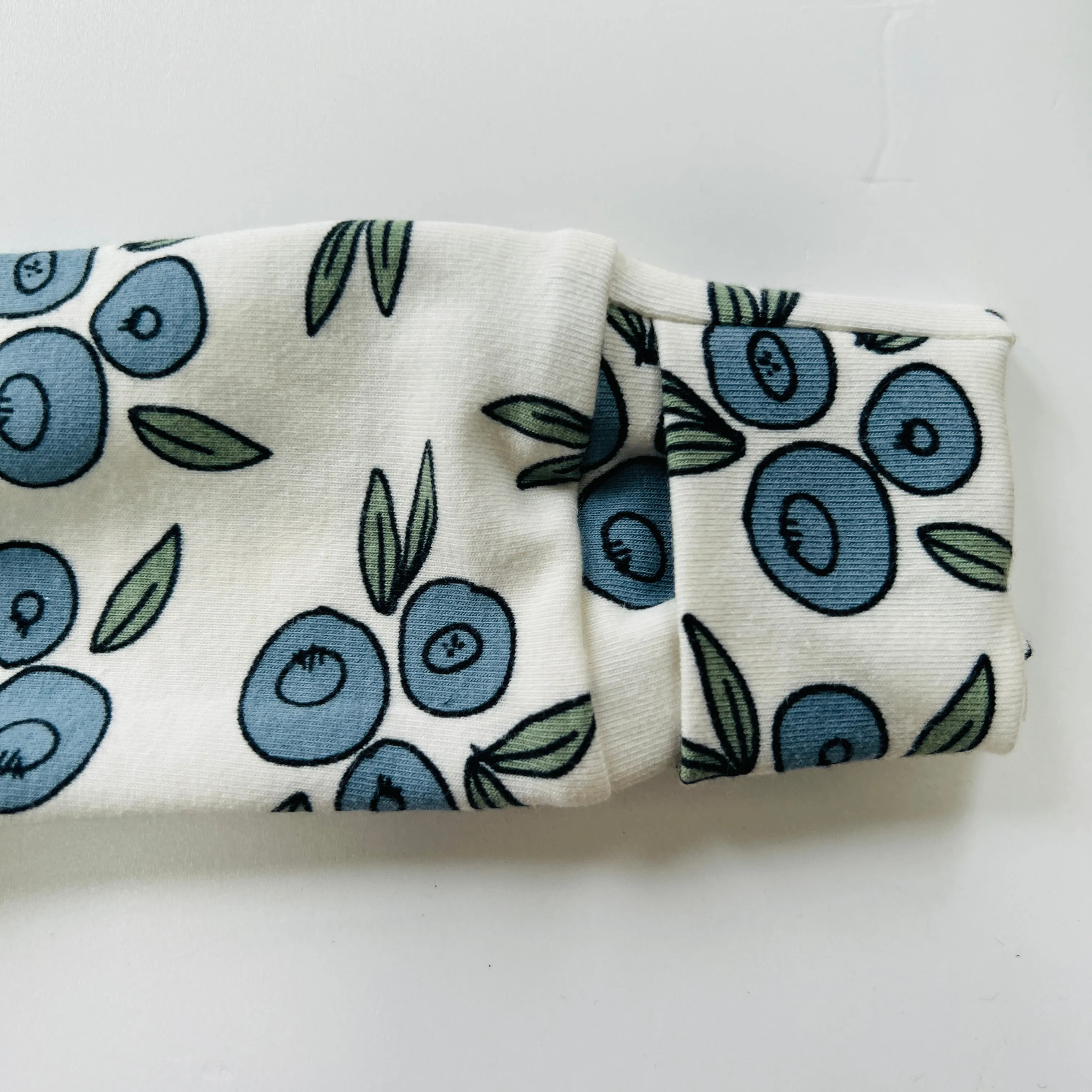 Eddie & Bee organic cotton Baby sleepsuit  in Cream " Blueberry " print.