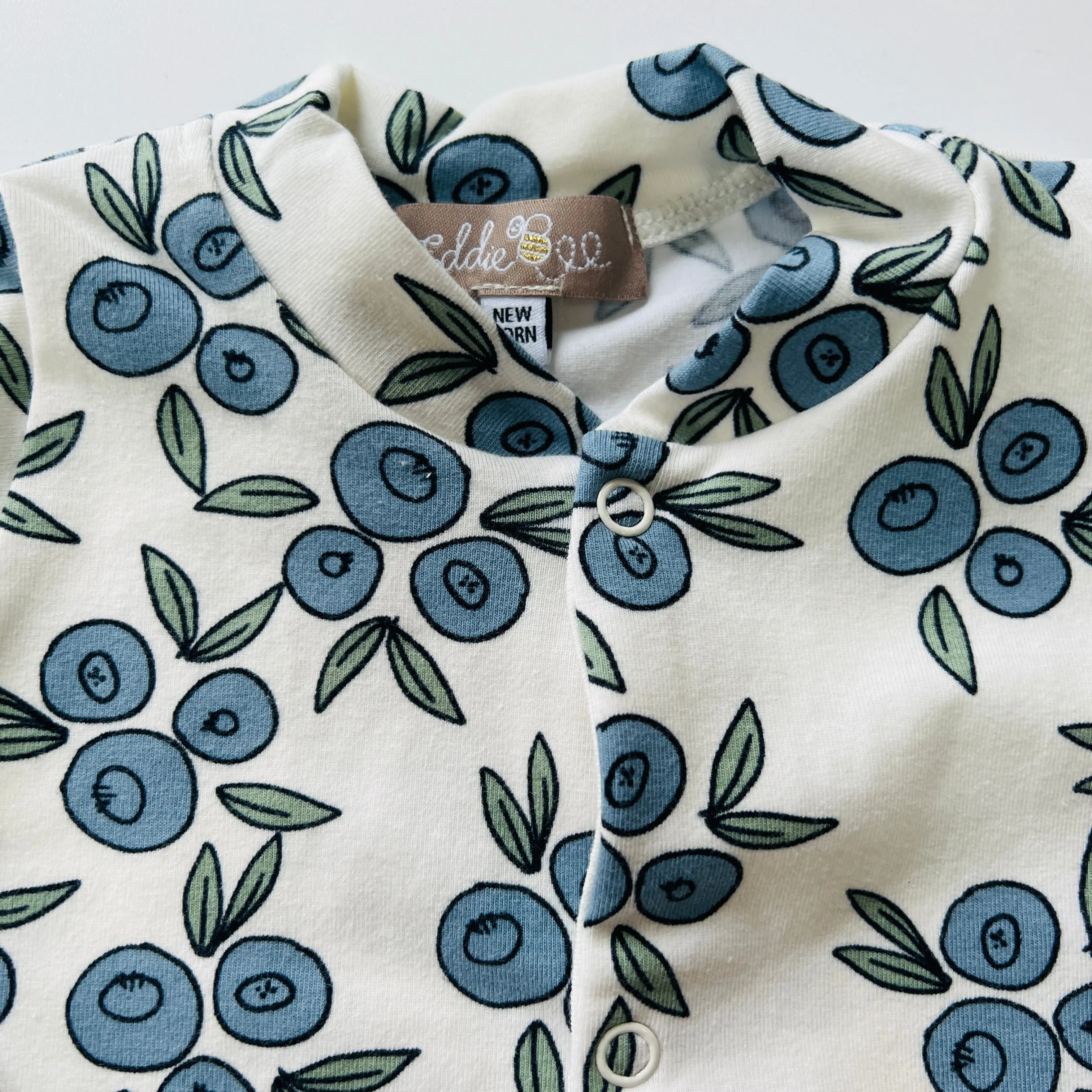Eddie & Bee organic cotton Baby sleepsuit  in Cream " Blueberry " print.